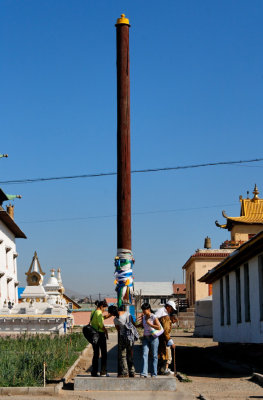 A symbolic pole, commemorating a building that once stood here, near Gandan Monestary