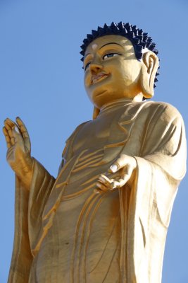 Buddha statute in a park near the Zaisan Memorial