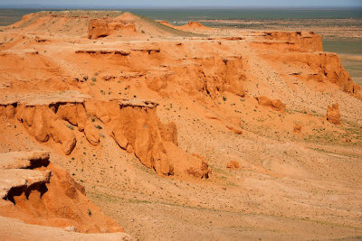 The Flaming Cliffs get their name from the red color of the exposed soil and rock