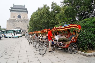 Pedicabs arrayed near the Drum and Bell Towers, ready for Hutong tours