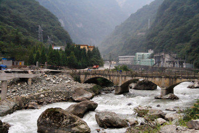 Road construction and hydroelectric power plants are a constant sight on the way to Wolong
