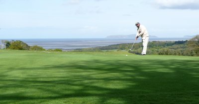 Putting on 17th green.