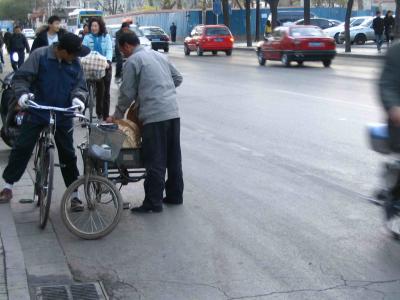 Beijing street - wood seller