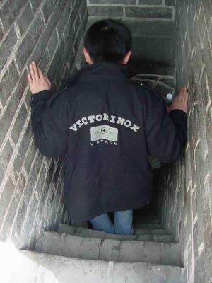 Juyong Guan - a tight squeeze to get down the tower stairs
