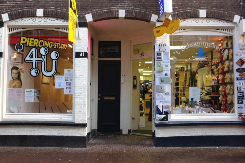 Gouda: piercing and wooden shoes