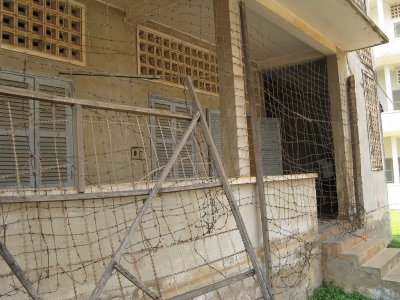 The barbed wire was used to keep people in, or trying to jump to their deaths from the higher floors