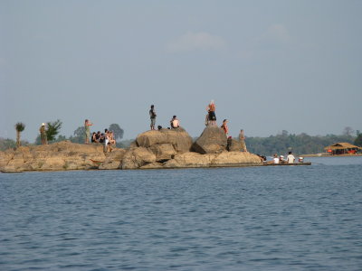 Falang (foreigners) watching for the endangered freshwater Mekong dolphin