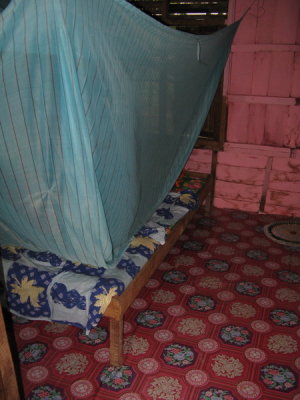 Don't let the bed fool you- it's hard as a rock, just like every other bed in SE Asia