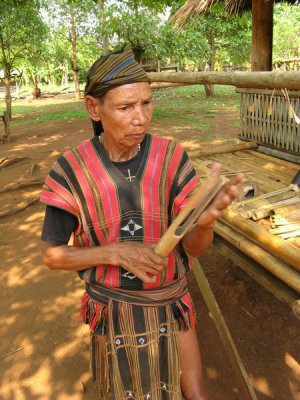 This man took the time to show me how to play all of the local instruments