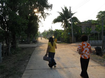 Walking to the neighborhood temple for a New Year's ceremony