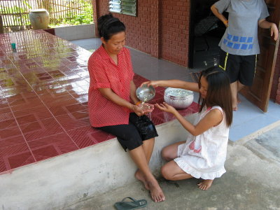 The formal Songkran ceremony honoring Pen's mother