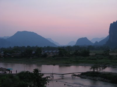 Vang Vieng is set in a stunning landscape of limestone hills, next to the Nam Song River