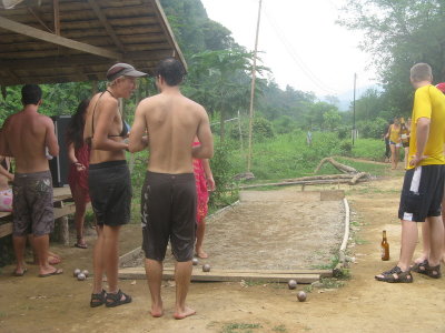 Lawn bowling at the next bar- quite popular in Lao, likely due to the French influence