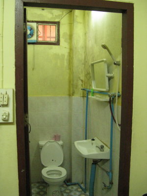 Typical bathroom- this guesthouse cost me about $12, but had hot water and AC!