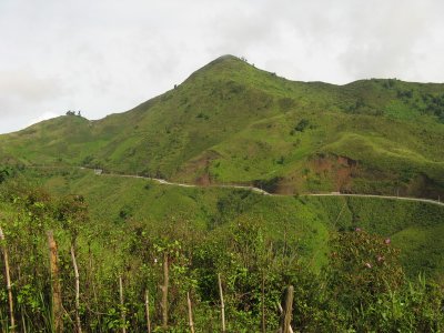 The road winding along the mountainside