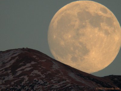 Rising full moon over Mt.Yakusi