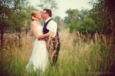 Wedding portrait in a field.jpg