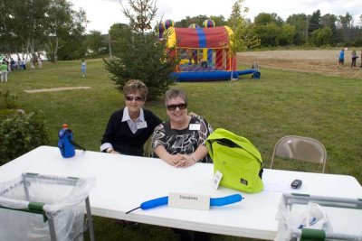 Greeters at the Welcome/Donation Table