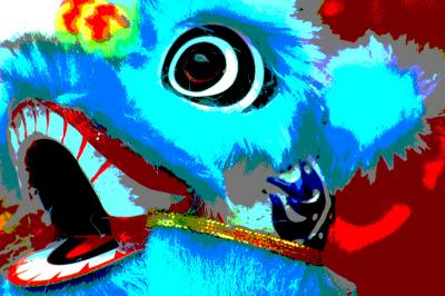One of the most spectacular sights during the Chinese Lunar New Year Festival is the lion dance.
The heads of these fearsome beasts are supposed to ward off evil, and the nimble
movements of the dancers provide a grand spectacle enjoyable to everyone.