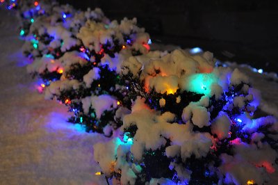 Celebrating the first winter snow with our holiday lights