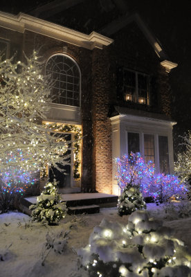 Celebrating the first winter snow with our holiday lights