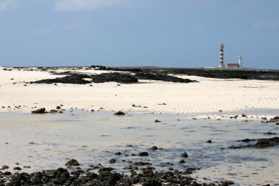 Lighthouse and the beach
