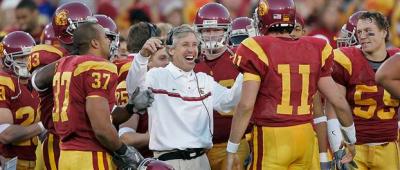 Pete Carroll, center, and the Trojans are riding a 34-game winning streak into the Rose Bowl..jpg