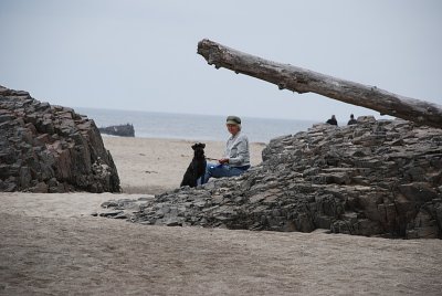 SARA AND CHARLIE SPEND A QUIET MOMENT ON THE BEACH