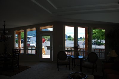 THE GREAT ROOM WAS ALL GLASS OVERLOOKING THE FRONT DECK