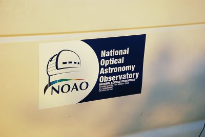 EVEN NOAO HAD TO LEAVE ITS MARK-THIS TIME ON THE SIDE OF A KITT PEAK VEHICLE