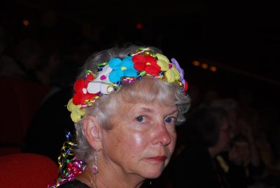 IT IS A TRADITION FOR LADIES TO WEAR FLOWERS IN THEIR  HAIR DURING FIESTA