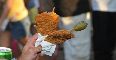 ONLY AT FIESTA SAN ANTONIO CAN YOU GET A FRIED CHICKEN BREAST ON A STICK TOPPED WITH A JALAPENO POPPER