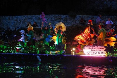 AS THE NIGHT BECAME DARKER THE FLOATS BECAME BRIGHTER