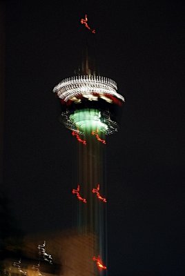 THE WORLD'S FAIR NEEDLE JIGGLED AND GLOWED AS WE LEFT THE RIVERWALK PARADE