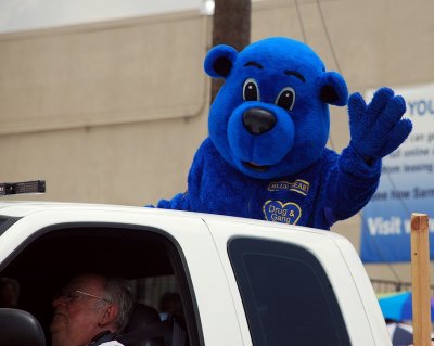 THE SAN ANTONIO POLICE DRUG PREVENTION MASCOT BLUE DOG  WAVED TO THE CROWD