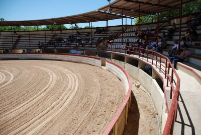 A CHARREADA IS HELD IN A KEY SHAPED ARENA