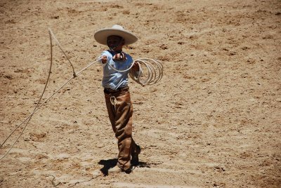 THIS YOUNG CHARRO WOWED THE CROWD WITH HIS ROPE WORK BEFORE THE CHARREADA BEGAN