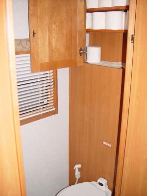 BATHROOM WITH STORAGE ABOVE