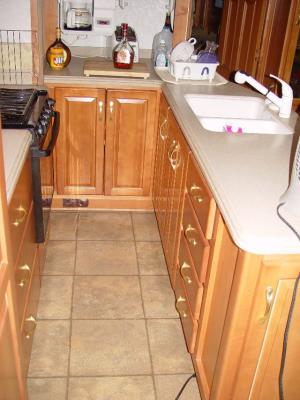 STORAGE BELOW THE COUNTER IN KITCHEN