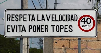 A SIGN ANNOUNCING THE FAMOUS BAJA TOPE AHEAD