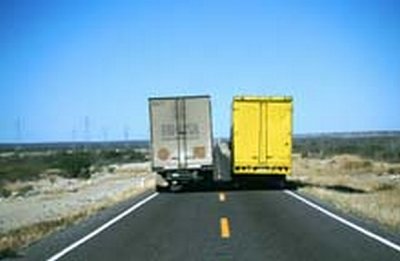 THE TRUCKS COME THIS CLOSE TO EACH OTHER...
