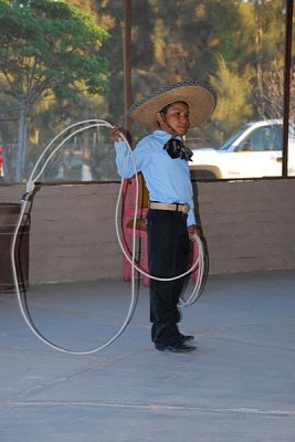 AFTER THE DANCES THERE WAS A ROPE TWIRLING ACT WHICH REFLECTED THE COWBOY CULTURE OF MUCH OF THE BAJA
