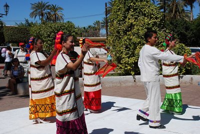 THESE WERE SOME NATIVE FOLK DANCERS PERFORMING IN A NEARBY CITY SQUARE.