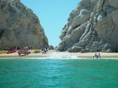LOVERS BEACH ON THE GENTLE SEA OF CORTEZ SIDE WAS FILLED WITH BATHERS