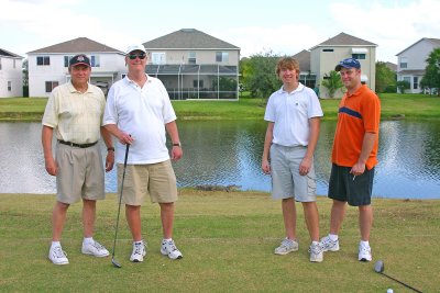 The Mulligan Brothers with a gator in the middle