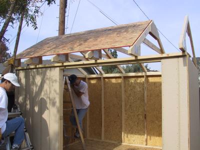 First roof board in place