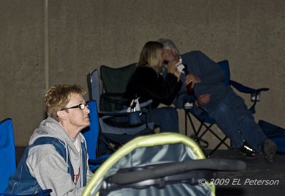 During a night of music some are talking and some are focused.