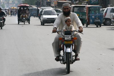 Motorcycle Ride Through Traffic, Lahore, Pakistan