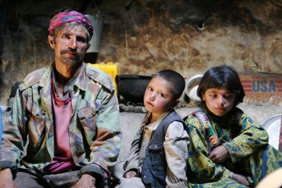 Father, Kids and US AID Box, Badakhshan, Afghanistan