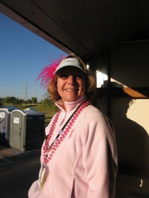 Cheryl standing and waiting to get the flags